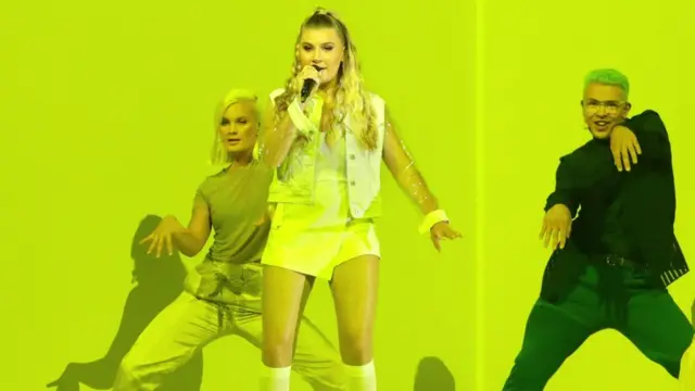 Michela (centre) with backing dancers