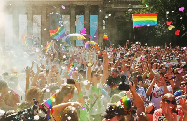 A crowd celebrates the "Yes" campaign's victory in Melbourne in 2017