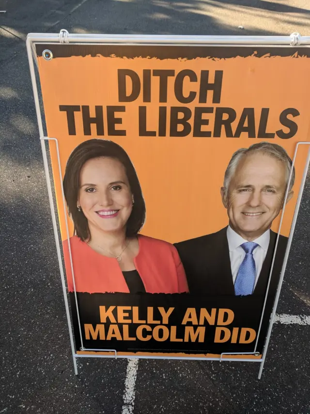 An anti-Liberal campaign poster in Higgins says: "Ditch the Liberals - Kelly and Malcolm did".