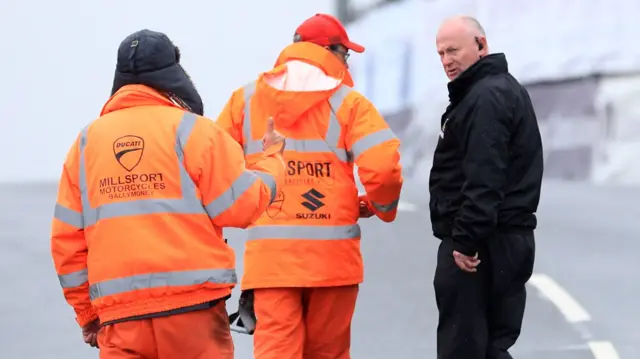 Mervyn Whyte checks on conditions on the NW200 course