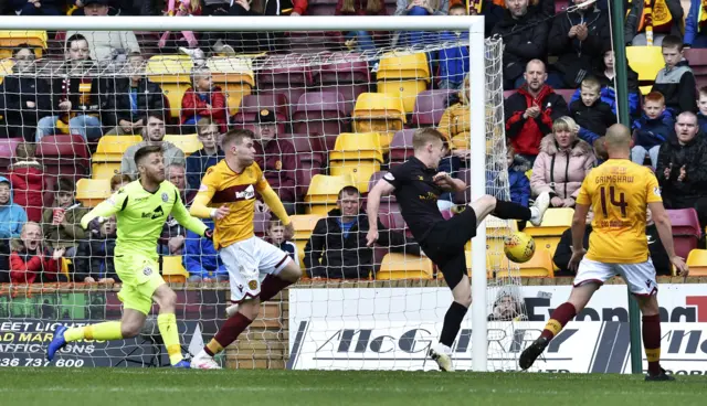 Livi sub Scott Tiffoney scored twice in the second half but Motherwell held on