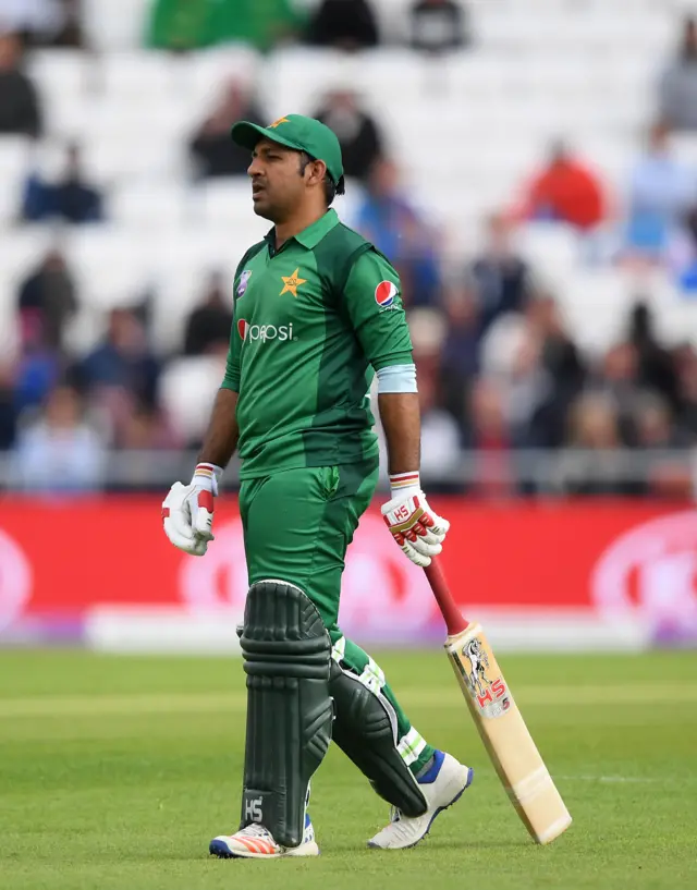 Sarfaraz Ahmed of Pakistan walks off after being dismissed