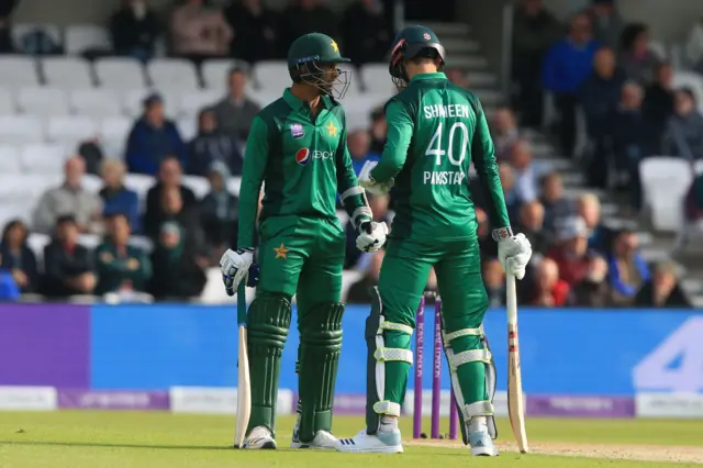 Pakistan's Shaheen Shah Afridi (L) and Mohammad Hasnain