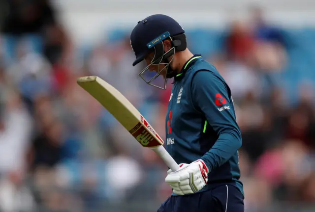 England's Joe Root looks dejected as he walks off after losing his wicket