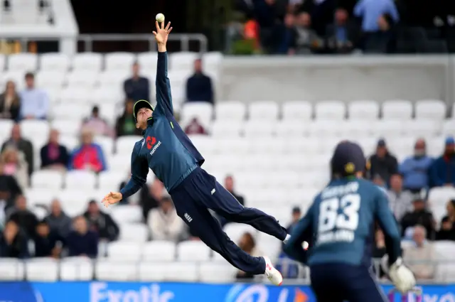 Joe Denly of England attempts to catch Imad Wasim