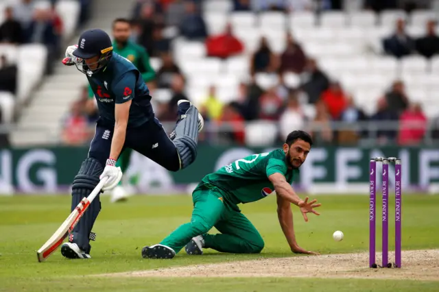 England's Chris Woakes in action with Pakistan's Hasan Ali