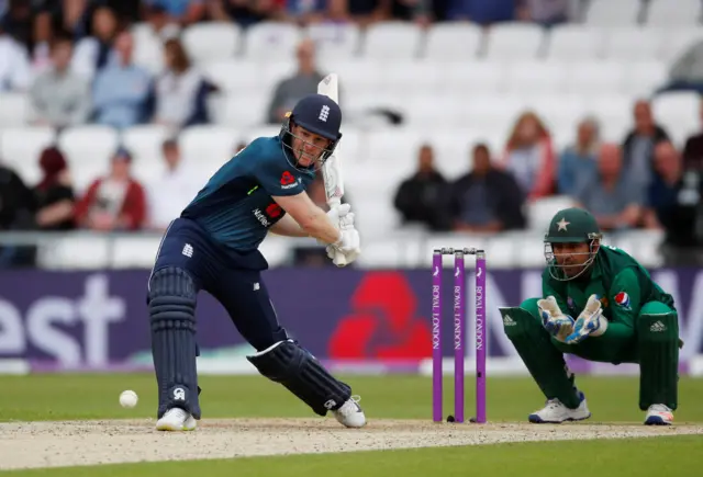 England's Eoin Morgan hits a six