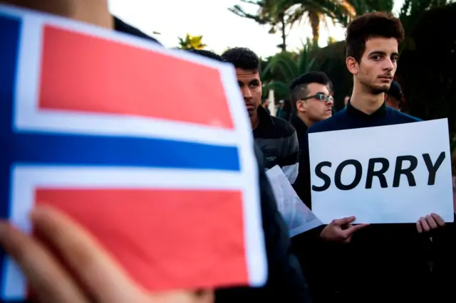 Moroccans pay tribute to murdered Danish Louisa Vesterager Jespersen and Norwegian Maren Ueland in Rabat, in front the Danish Embassy on 22 December 2018.