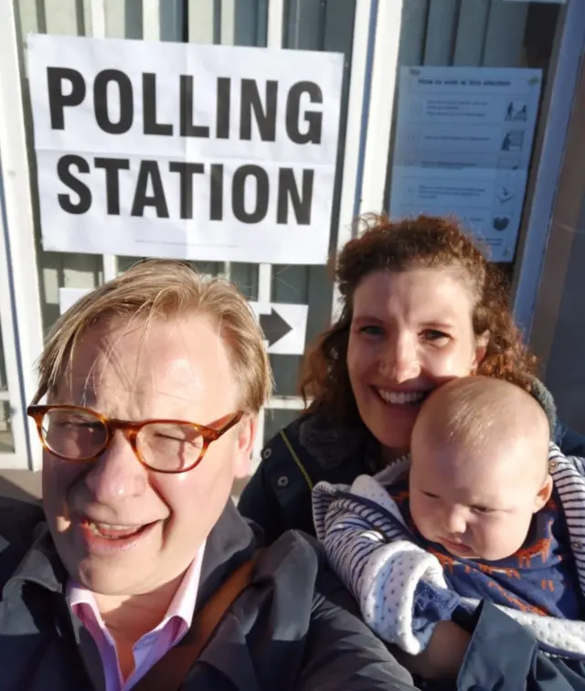 Verity Cowley with her baby at a polling station