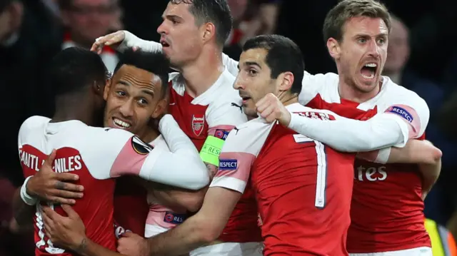 Pierre-Emerick Aubameyang celebrates with his Arsenal team-mates