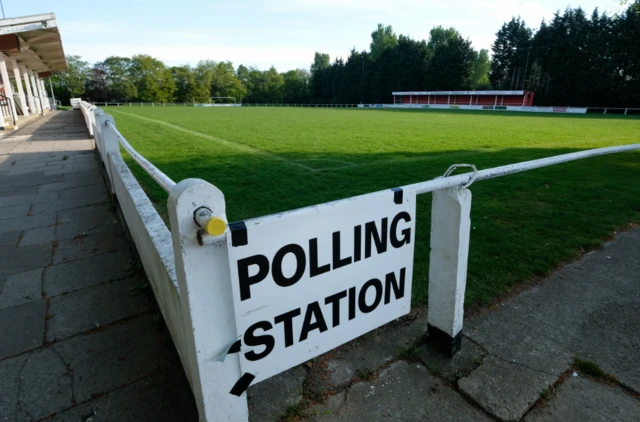 An image of a polling station sign