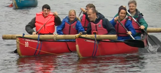 People in Canadian Canoes