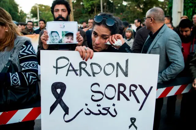 Moroccans pay tribute to murdered Danish Louisa Vesterager Jespersen and Norwegian Maren Ueland in Rabat, in front the Danish Embassy on 22 December 2018.