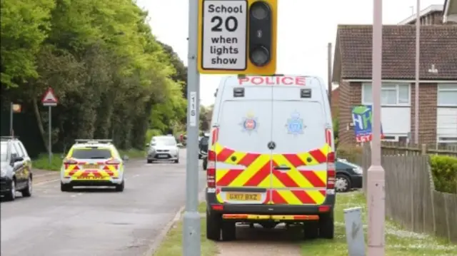 Police at scene of manhunt