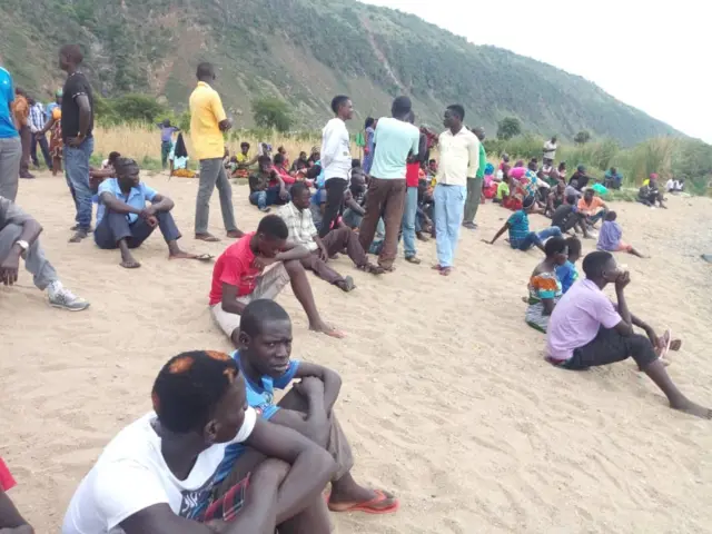 People gathered at the shore to get news about missing relatives