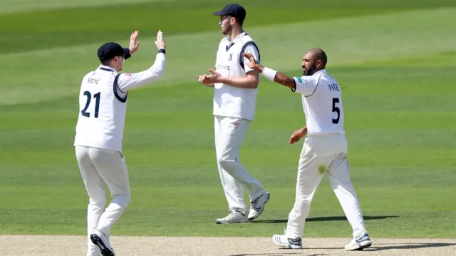 Warwickshire celebrating a wicket against Hampshire