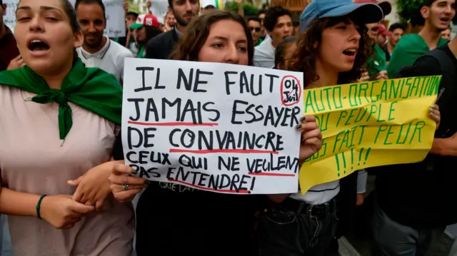 Algerian students take part in a demonstration near the government palace in the capital Algiers on 21 May 2019