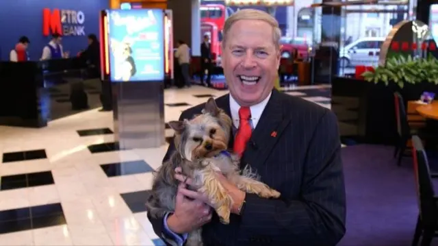 Metro Bank chair Vernon Hill, pictured with dog Duffy, founded the bank in 2010