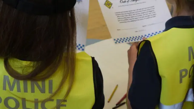 School pupils taking part in the "mini police" scheme