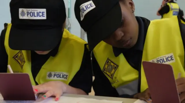 School pupils taking part in the "mini police" scheme