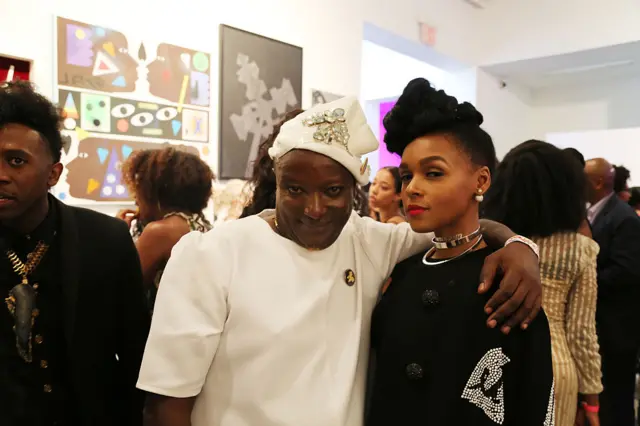 Binyavanga Wainaina and Janelle Monae attend Wangechi Mutu's Africa's Out! Inaugural Fundraiser To Benefit UHAI EASHRI at Gladstone Gallery on June 5, 2015 in New York City.