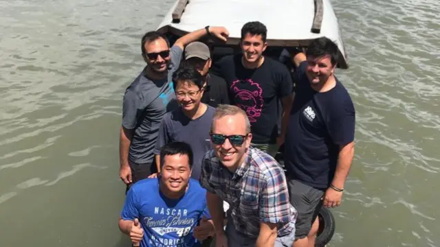 Gareth Ward with the team of scientists