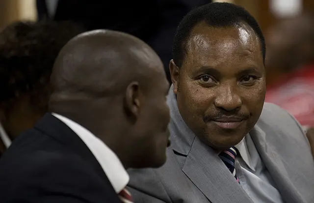 Kenya's Water Assistant Minister, Ferdinad Waititu (R), looks on in a Nairobi court on September 27, 2012 after being charged with incitement to violence and hate speech in connection to utterances he made against the Maasai community in Nairobi’s Kayole Estate.