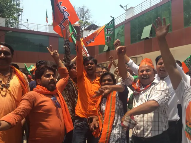 BJP supporters in Lucknow celebrate after trends suggest major victory