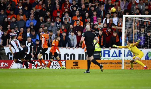 St Mirren's Kyle Magennis watches his shot saved by Benjamin Siegrist