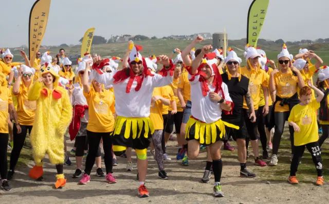 Runners dressed as chickens