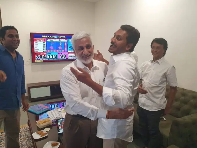 Jagan Mohan Reddy (R) with a party member