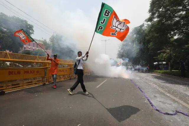 Supporters of Bharatiya Janata Party (BJP) celebrate