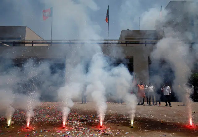 Supporters of Bharatiya Janata Party (BJP) celebrate