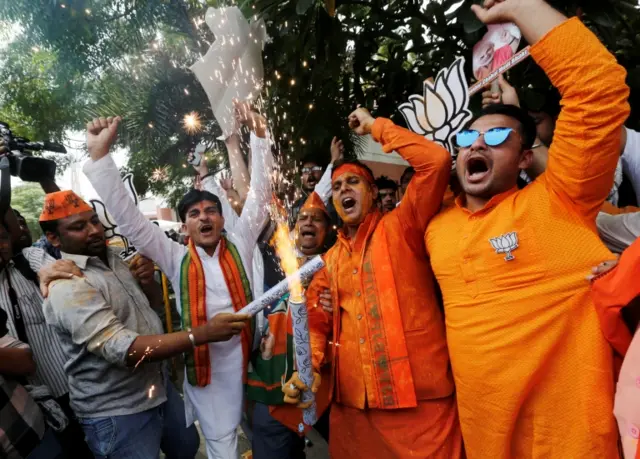 BJP supporters outside party headquarters in New Delhi.