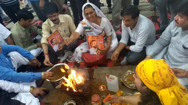 Congress party workers offering prayer