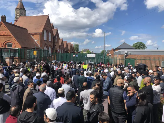 Crowds outside school