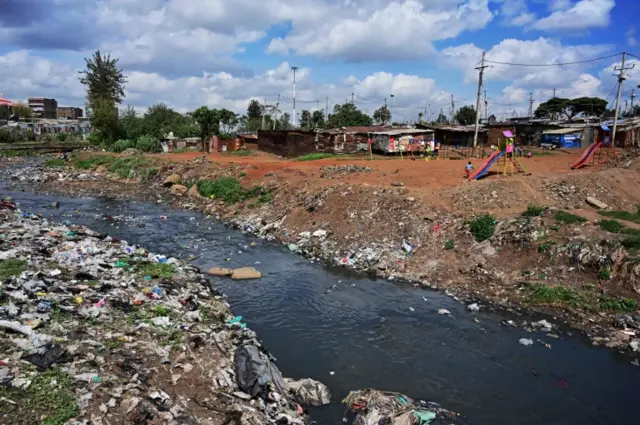 A childrens playground located on the banks of the Nairobi River on May 17, 2019, in Nairobi, at a micro-recreation park initiated by slum youth that is situated on a section of the bank reclaimed from river"s heavily polluted waters at Nairobi"s Korogocho shanty town where atleast 69, mostly reforming hoodlums and dilinquents, are now eching out a livelyhood cleaning up the river and it's environs.