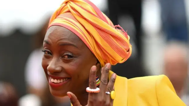 Burkinabe film director Maimouna N'Diaye smiles for the paparazzi at the Cannes film festival on Wednesday ahead of judging the competitors for the coveted Palme d'Or award.