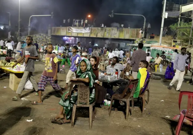 Sudanese protesters congregate at the site of a sit-in, near the Army Head quarters, in Khartoum, Sudan, 22 May 2019