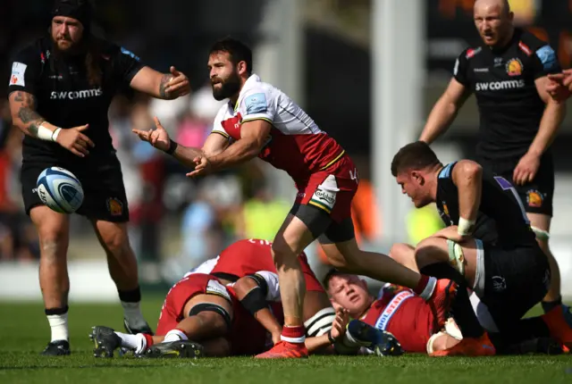 Cobus Reinach throws a pass for Northampton