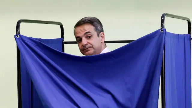 Greek main opposition party New Democracy Kiriakos Mitsotakis votes at a polling station during the triple elections, for Local Government, Regional Government and the European Parliament, in Athens, Greece, 26 May 2019