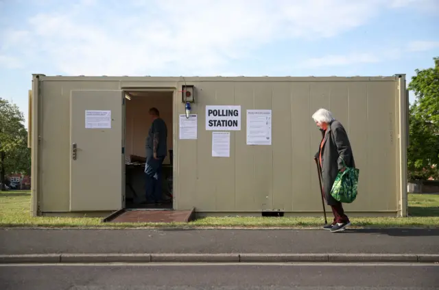 Woman goes to polling station