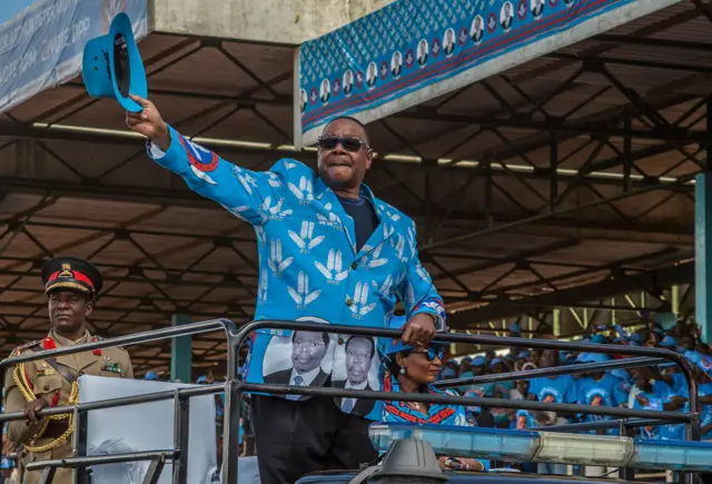 Malawi's President Peter Mutharika salutes the crowd