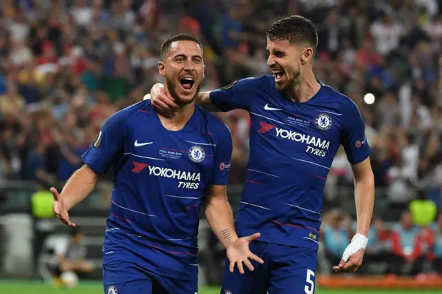 Chelsea"s Belgian midfielder Eden Hazard (L) celebrates with Chelsea"s Italian midfielder Jorginho