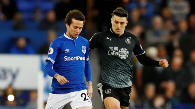 Everton's Bernard in action with Burnley"s Matthew Lowton