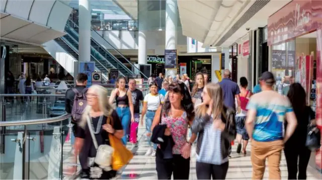 Shoppers at one of Intu's centres