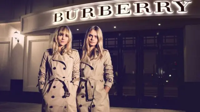 Burberry trenchcoats, models