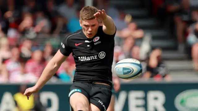 Owen Farrell kicks a penalty goalwards