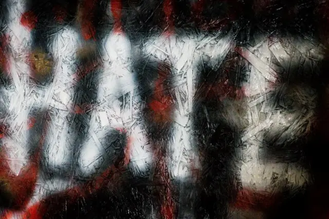 Graffiti saying hate