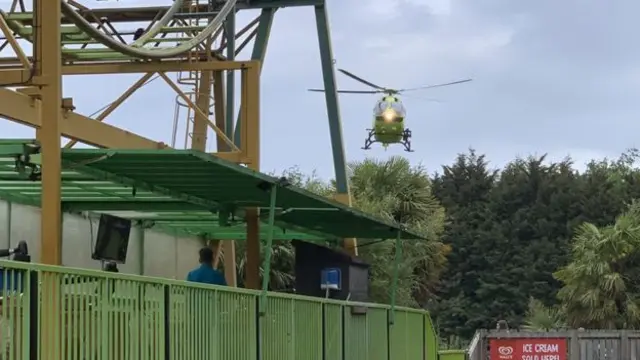 A helicopter and a rollercoaster